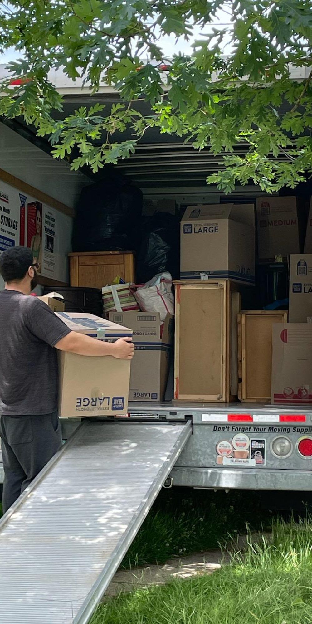 CC Enterprise moving truck being loaded